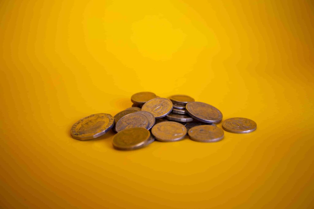coins in yellow background
